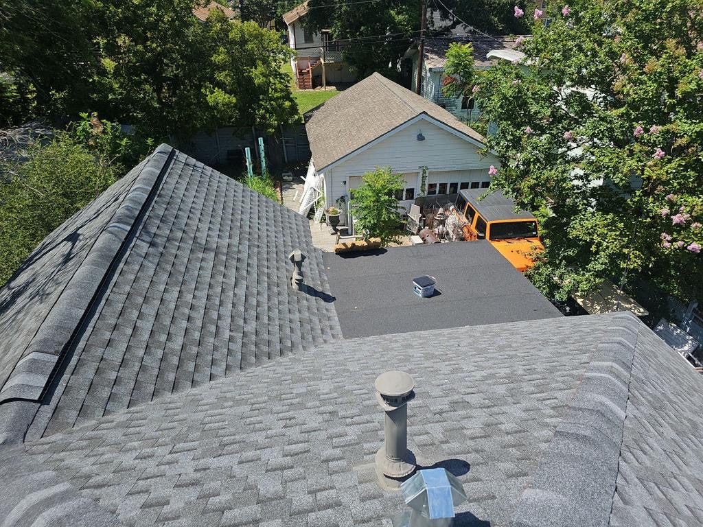 New architectural shingle roof in a residential neighborhood
