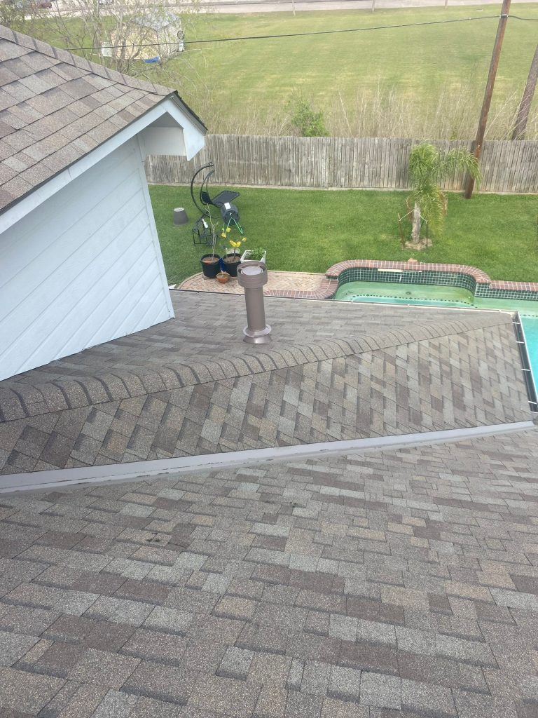New shingle roof overlooking a backyard pool