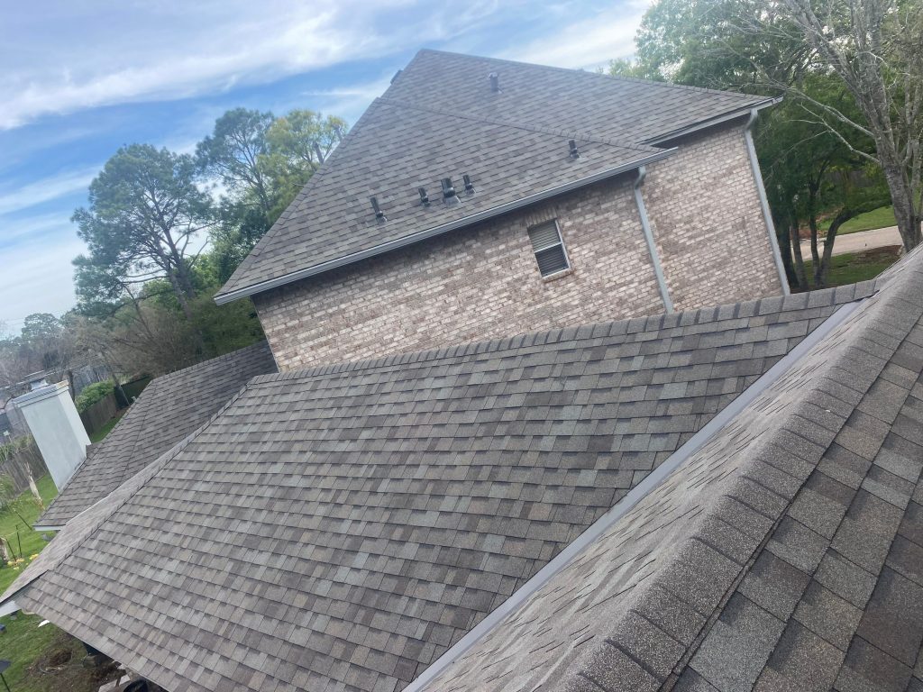 Multi-level architectural shingle roof on a brick home