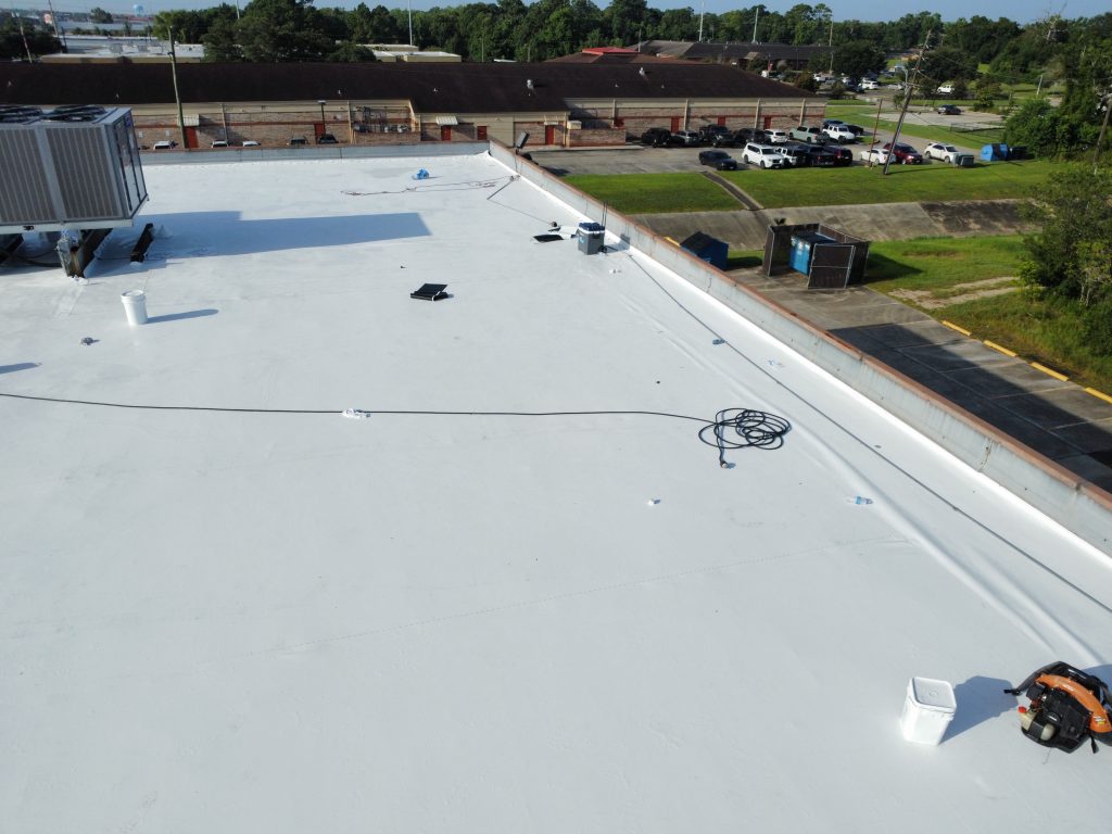 Finished white TPO flat roof on a commercial building